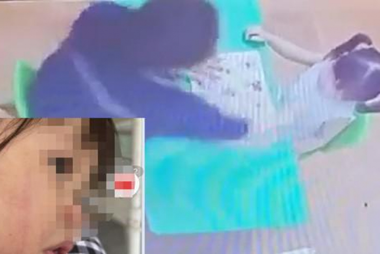 Cô giáo T "Tát động vật lý" vào bé N. Ảnh cắt từ clip Cô giáo T "Tát động vật lý" vào bé N. Ảnh cắt từ clip