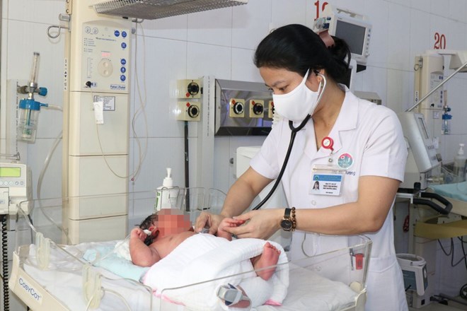 Bé trai chào đời nặng 6,1kg. Ảnh: Hạnh Loan. Bé trai chào đời nặng 6,1kg. Ảnh: Hạnh Loan.